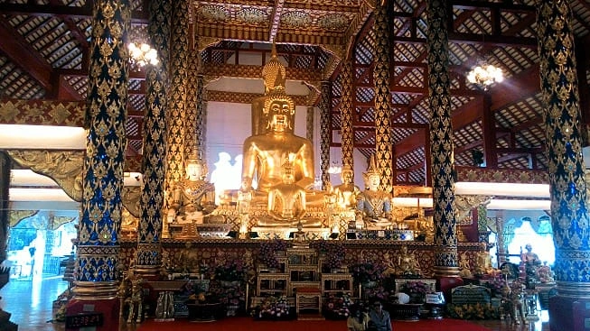 CMLocals Chiang Mai Locals healthcare wellness culture golden Buddha statue at Wat Phra Singh temple
